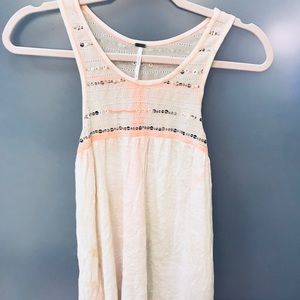 lightly detailed around the top, flowy tank top